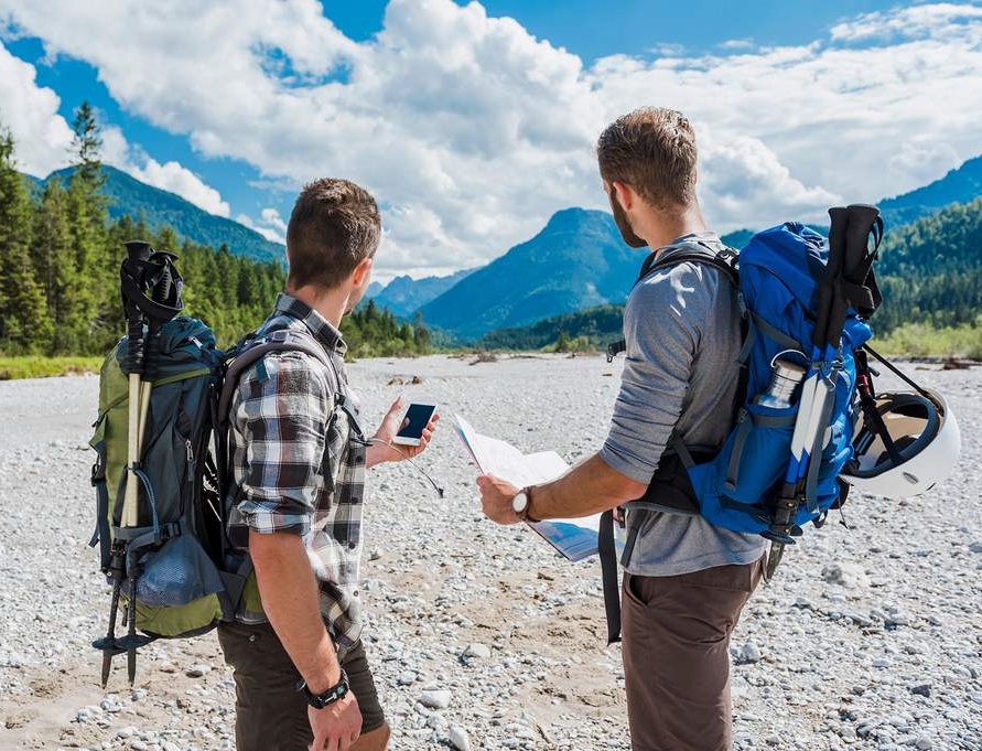 two tourists in the mountains